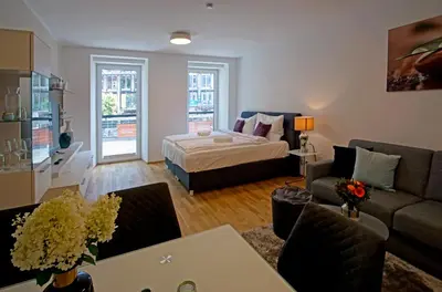 Ein Bett oder Betten in einem Zimmer der Unterkunft English Theater Apartment at Rathaus