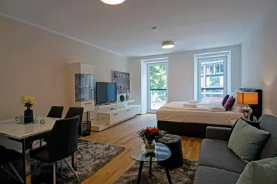 Ein Bett oder Betten in einem Zimmer der Unterkunft English Theater Apartment at Rathaus