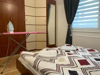 Ein Bett oder Betten in einem Zimmer der Unterkunft VEA Vienna Apartment