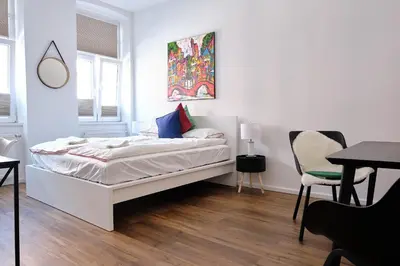 Ein Bett oder Betten in einem Zimmer der Unterkunft Vienna Experience