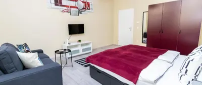 Ein Bett oder Betten in einem Zimmer der Unterkunft Radiant Premium Apartments - Fünfhaus