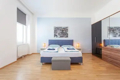 Ein Bett oder Betten in einem Zimmer der Unterkunft Lodge in Style Vienna - Austria Campus