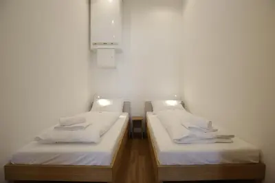 Ein Bett oder Betten in einem Zimmer der Unterkunft Vienna Gold Apartments - contactless check in