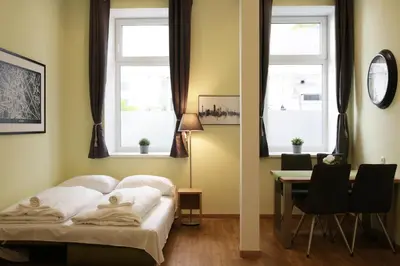 Ein Bett oder Betten in einem Zimmer der Unterkunft Vienna Gold Apartments - contactless check in