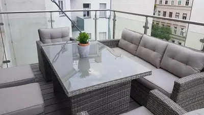 Ein Sitzbereich in der Unterkunft Loft #11 mit großer Loggia und Terrasse