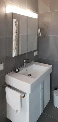 Ein Badezimmer in der Unterkunft Loft #11 mit großer Loggia und Terrasse