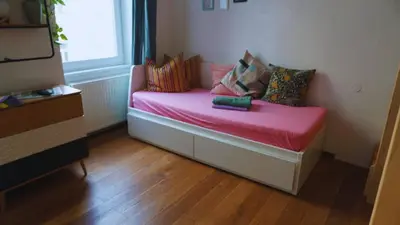 Ein Bett oder Betten in einem Zimmer der Unterkunft Apartment mit Balkon