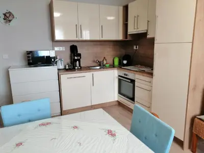 Küche/Küchenzeile in der Unterkunft Campingblick-Gästehaus-Ferienwohnungen