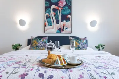Ein Bett oder Betten in einem Zimmer der Unterkunft BOUTIQUE RESIDENCES at GAUDENZDORFER