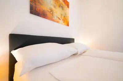 Ein Bett oder Betten in einem Zimmer der Unterkunft Vienna Residence, Herbststraße - Ottakring