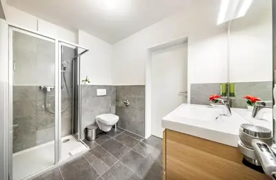 Ein Badezimmer in der Unterkunft Jimmy's Apartments Lory