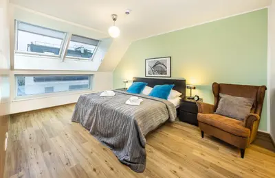 Ein Bett oder Betten in einem Zimmer der Unterkunft Jimmy's Apartments Lory