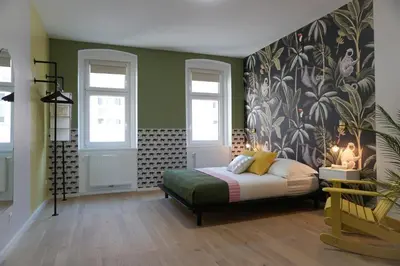 Ein Bett oder Betten in einem Zimmer der Unterkunft Large Apartments - Great for Groups - with Balcony or Terrace