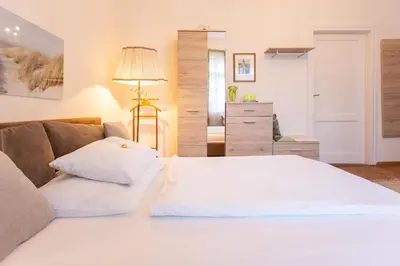 Ein Bett oder Betten in einem Zimmer der Unterkunft Hübsches Privatzimmer mit Bad