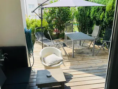 Ein Balkon oder eine Terrasse in der Unterkunft GARDEN Apartment PLUS private Beach