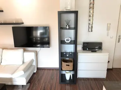 TV/Unterhaltungsangebot in der Unterkunft GARDEN Apartment PLUS private Beach