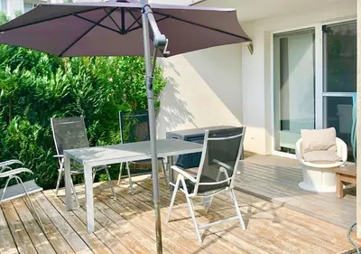 Ein Patio oder anderer Außenbereich in der Unterkunft GARDEN Apartment PLUS private Beach