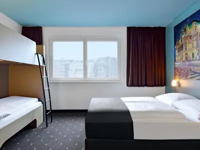 Ein Bett oder Betten in einem Zimmer der Unterkunft B&B Hotel Wien-Hbf