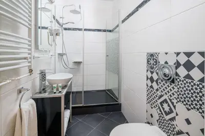 Ein Badezimmer in der Unterkunft Best Western Plus Celebrity Suites