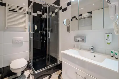 Ein Badezimmer in der Unterkunft Best Western Plus Celebrity Suites