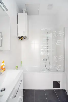 Ein Badezimmer in der Unterkunft UNIVERSUM APARTMENT