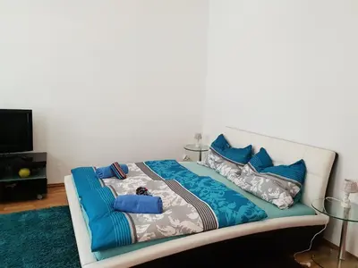 Ein Bett oder Betten in einem Zimmer der Unterkunft Nina