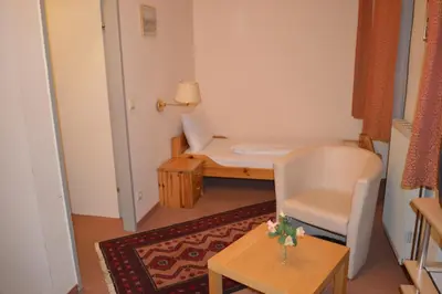 Ein Bett oder Betten in einem Zimmer der Unterkunft Hotel Pension Walzerstadt