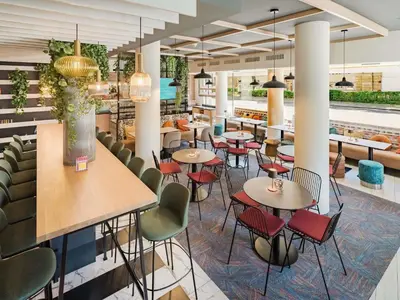 Ein Restaurant oder anderes Speiselokal in der Unterkunft Ibis Styles Wien City