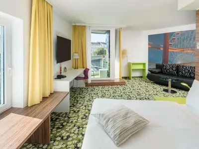 Ein Bett oder Betten in einem Zimmer der Unterkunft Ibis Styles Wien City