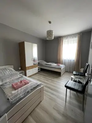 Ein Bett oder Betten in einem Zimmer der Unterkunft Privatzimmer Hammrich