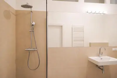 Ein Badezimmer in der Unterkunft HeyMi Apartments Stadtpark