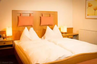 Ein Bett oder Betten in einem Zimmer der Unterkunft Gasthof OHR
