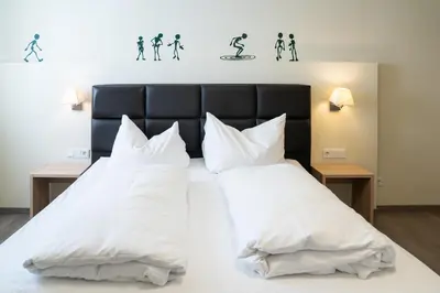 Ein Bett oder Betten in einem Zimmer der Unterkunft Gasthof OHR