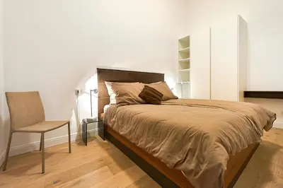 Ein Bett oder Betten in einem Zimmer der Unterkunft Central Luxury Apartment