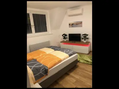 Ein Bett oder Betten in einem Zimmer der Unterkunft Walzhofer Apartement