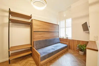 Ein Bett oder Betten in einem Zimmer der Unterkunft Nove Boutique Apartments