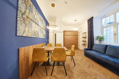 Ein Sitzbereich in der Unterkunft Nove Boutique Apartments