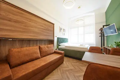 Ein Sitzbereich in der Unterkunft Nove Boutique Apartments