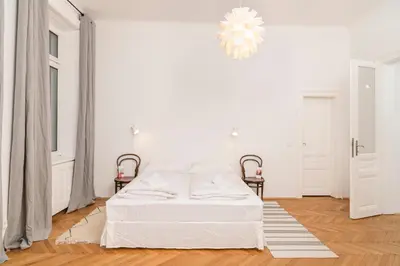 Ein Bett oder Betten in einem Zimmer der Unterkunft Design Loft Hohe Warte