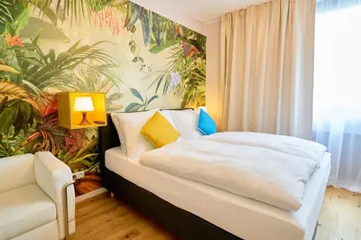 Ein Bett oder Betten in einem Zimmer der Unterkunft Leuhusen Center Apartments Vienna, Wien