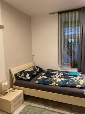 Ein Bett oder Betten in einem Zimmer der Unterkunft Viktoria ARTUR