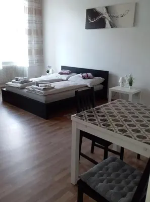 Ein Bett oder Betten in einem Zimmer der Unterkunft Apartment Alser