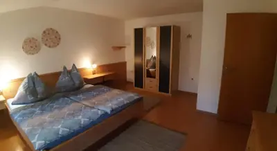 Ein Bett oder Betten in einem Zimmer der Unterkunft Haus Königshofer