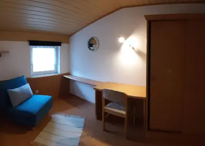Ein Sitzbereich in der Unterkunft Haus Königshofer