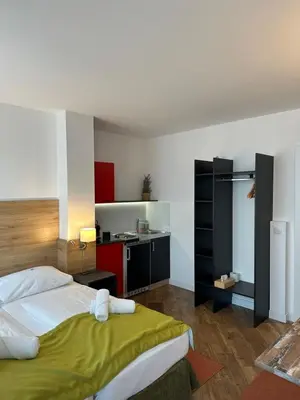 Ein Bett oder Betten in einem Zimmer der Unterkunft Versava Apartments