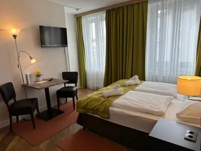 Ein Bett oder Betten in einem Zimmer der Unterkunft Versava Apartments