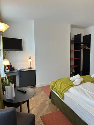 Ein Bett oder Betten in einem Zimmer der Unterkunft Versava Apartments