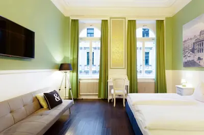 Ein Bett oder Betten in einem Zimmer der Unterkunft Boutique Hotel Columbia