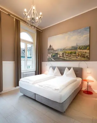 Ein Bett oder Betten in einem Zimmer der Unterkunft Boutique Hotel Columbia