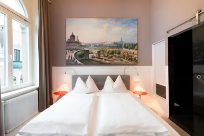 Ein Bett oder Betten in einem Zimmer der Unterkunft Boutique Hotel Columbia